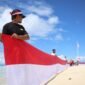 Penancapan dan pembentangan bendera Merah Putih di Pulau Sayafi dan Liwo. || dok : Sukarsi/Kasedata