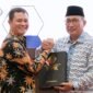 Wali Kota Ternate saat menerima LHP Semester II Tahun 2025 dari BPK Perwakilan Maluku Utara [Foto : ongky/kasedata]