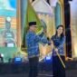 Gubernur Maluku Utara Sherly Tjoanda menerima bendera pataka sebagai tanda Malut mulai menyiapkan diri untuk menyambut pelaksanaan MTQ KORPRI 2028. || dok : Kasedata