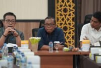 Kepala BPKAD Maluku Utara, Ahmad Purbaya didampingi Pemimpin Cabang Branch Office BRI Kota Ternate, Agus Arsyad. || Foto : Kasedata.id